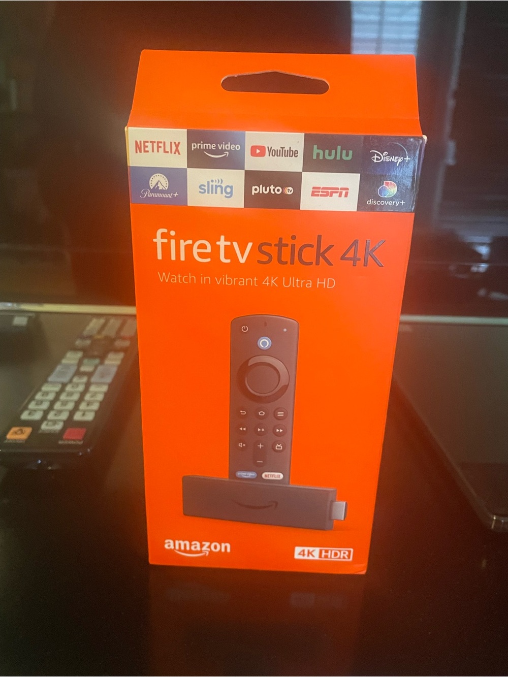 Amazon Fire TV Stick 4K – Orange Packaging with Black Remote